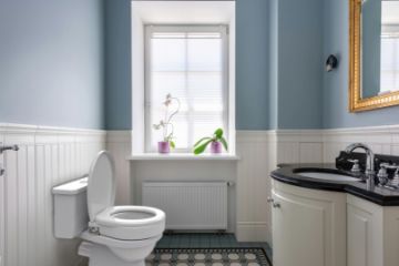 Durable Ashby Lift Oval Toilet Raiser fitted in a modern bathroom